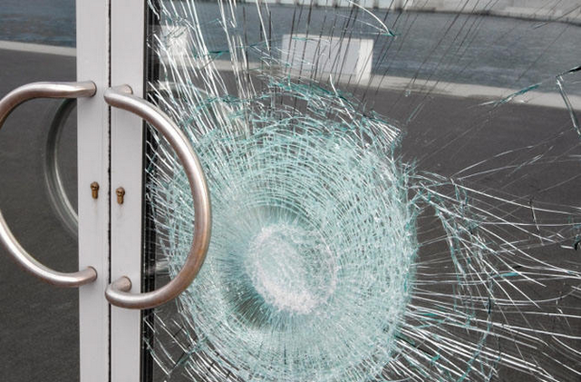 Broken Door in laminated Newmarket laminated Safety Glass